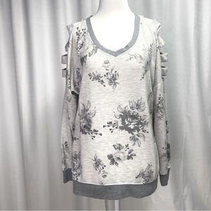 Maurice’s gray floral shirt with sleeve slits. Size Medium